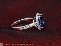 Witgouden ring met een ovale blauwe edelsteen - afbeelding 6 van  9