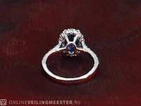 Witgouden ring met een ovale blauwe edelsteen - afbeelding 8 van  9