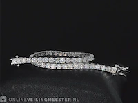 Witgouden tennisarmband met 6.07 carat briljant geslepen diamanten