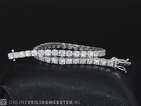 Witgouden tennisarmband met 7.16 carat briljant geslepen diamanten