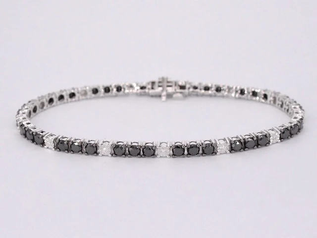 Witgouden tennisarmband rondom gezet met zwarte en witte diamanten - afbeelding 1 van  9