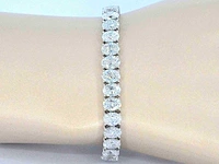 Zeer exclusieve tennisarmband met grote ovaal geslepen diamanten van 25.46 carat totaal - afbeelding 2 van  9