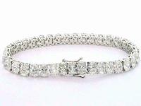 Zeer exclusieve tennisarmband met grote ovaal geslepen diamanten van 25.46 carat totaal - afbeelding 5 van  9