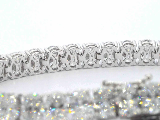 Zeer exclusieve tennisarmband met grote ovaal geslepen diamanten van 25.46 carat totaal - afbeelding 8 van  9