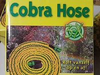 Zelf oprollende tuinslang geel in verpakking - afbeelding 1 van  3