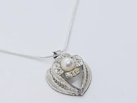 Zilveren collier met zoetwaterparel - afbeelding 1 van  7