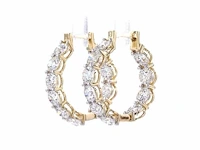 14 karaat geelgouden oorringen met 5,20 ct. diamant