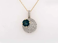 14 kt geelgouden ketting met hanger van 1,28 cts natuurlijke diamant en topaas