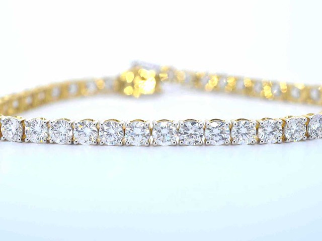 18 karaat gouden tennisarmband met briljant geslepen diamanten van 10 carat - afbeelding 1 van  7