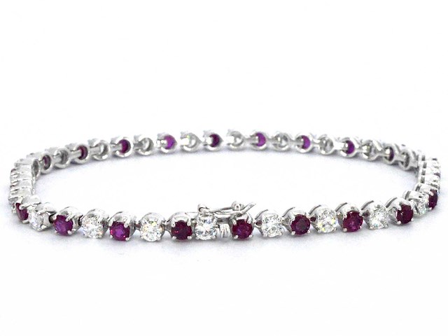 18 karaat gouden tennisarmband met diamanten en robijnen - afbeelding 1 van  4