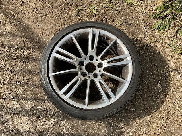 18” lichtmetalen bmw is37 velg 8,5jx18 eh2 v.v. bridgestone 255\35r18 band - afbeelding 1 van  7