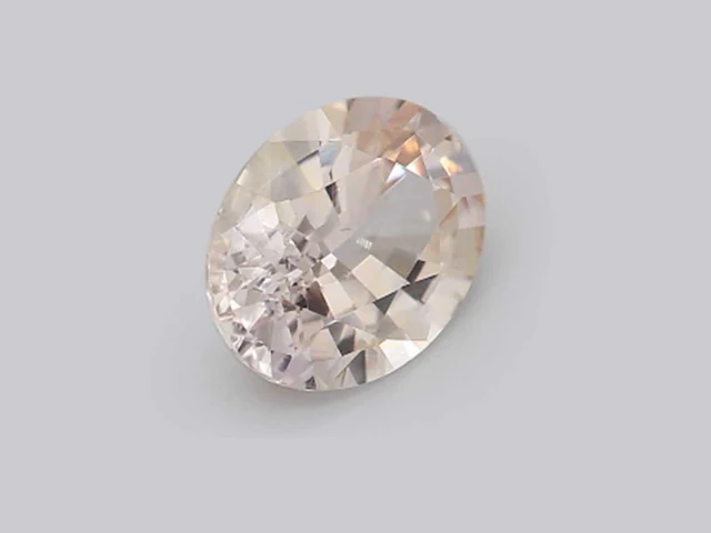 1,95 ct ovaal gesneden lichtroze topaas – misty rose - afbeelding 1 van  2