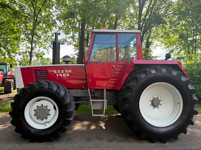 1975 steyr 1400 vierwielaangedreven landbouwtractor - afbeelding 4 van  11
