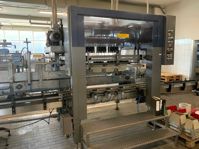 1985 stork packo sim1000 flessen inpakmachine - afbeelding 1 van  23