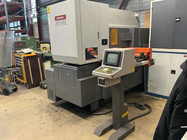 1987 nisshinbo mtp-500 ponsmachine - afbeelding 1 van  57