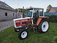 1989 steyr 8080 sk2 tweewielaangedreven landbouwtractor - afbeelding 1 van  22