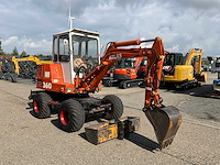1990 atlas 360 mobiele graafmachine (marge) - afbeelding 25 van  26