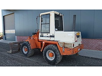 1990 schaeff - knikwiellader met roosterbak - afbeelding 12 van  20