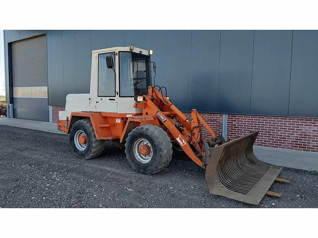 1990 schaeff - knikwiellader met roosterbak - afbeelding 12 van  20
