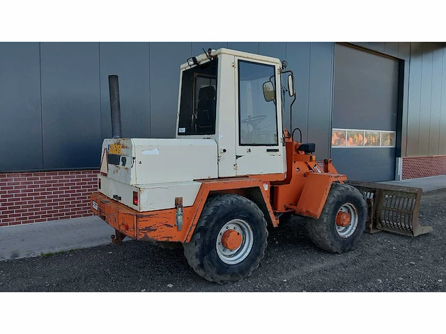 1990 schaeff - knikwiellader met roosterbak - afbeelding 6 van  20