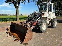 1992 caterpillar it14b knikgestuurde shovel