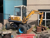 1992 komatsu pw30 banden graafmachine - afbeelding 1 van  8