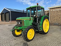 1996 john deere 6100 vierwielaangedreven landbouwtractor - afbeelding 1 van  25