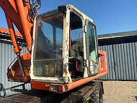 1997 atlas 1404 banden graafmachine - afbeelding 2 van  5