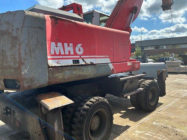1999 o&k mh6 banden graafmachine - afbeelding 26 van  29