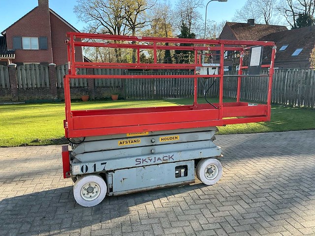 1999 sky jack sj 3 3220 hoogwerker - afbeelding 1 van  24