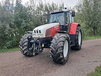 1999 steyr - 9145 - vierwielaangedreven landbouwtractor - afbeelding 1 van  18