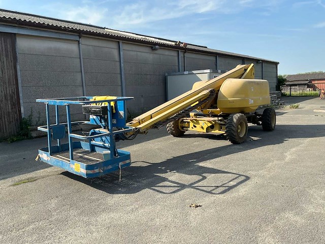 1999 zelfrijdende telescoophoogwerker met werkplatform grove gt141da - afbeelding 1 van  37