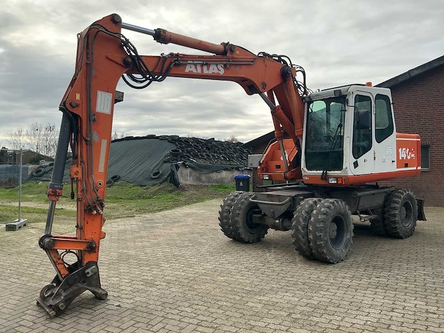 2000 atlas 1404 banden graafmachine - afbeelding 1 van  28