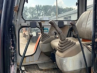 2000 hitachi ex22 minigraver – 2.200 kg – zwenkgiek - afbeelding 1 van  11
