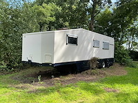 2003 camperbouw holland - be-oplegger ingericht als complete woon-/verblijfswagen met garage, generator, zonnepanelen en hydraulisch nivelleersysteem