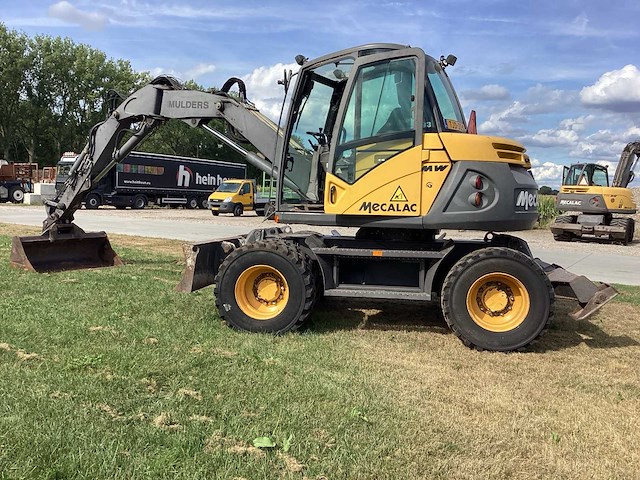 2004 mecalac 714 mw banden graafmachine - afbeelding 34 van  37