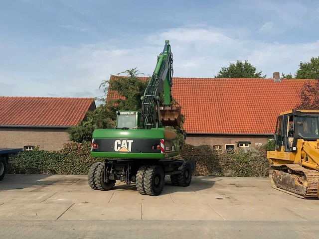 2006 caterpillar m322c banden graafmachine - afbeelding 7 van  49