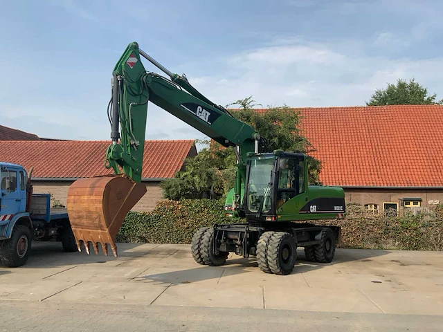 2006 caterpillar m322c banden graafmachine - afbeelding 23 van  49
