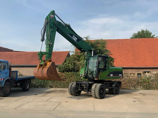 2006 caterpillar m322c banden graafmachine - afbeelding 34 van  49