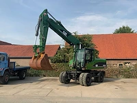2006 caterpillar m322c banden graafmachine - afbeelding 34 van  49