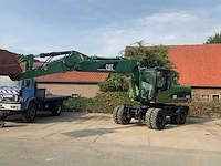 2006 caterpillar m322c banden graafmachine - afbeelding 47 van  49