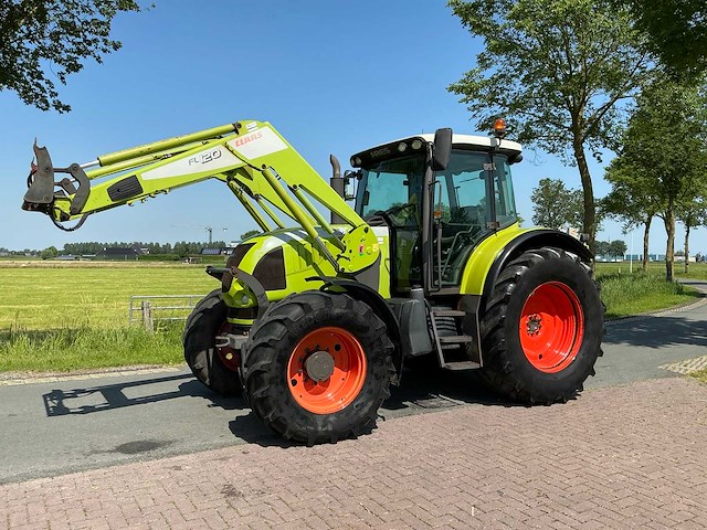 2006 claas ares 657 atz vierwielaangedreven landbouwtractor met voorlader - afbeelding 1 van  12