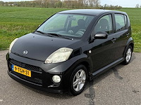 2006 daihatsu sirion 2 1.3-16v comfort personenauto - afbeelding 1 van  12