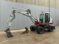 2006 takeuchi tb175w mobiele graafmachine met cw10, 2 bakken en extra banden