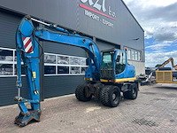 2007 new holland mh plus banden graafmachine - afbeelding 1 van  10