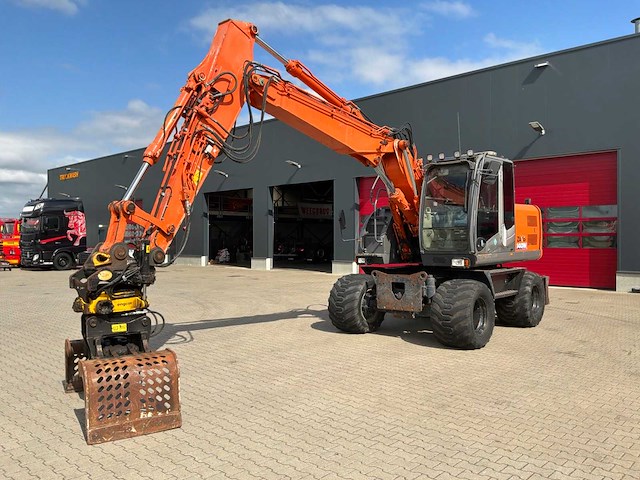 2009 hitachi zx140w-3 banden graafmachine - afbeelding 1 van  34