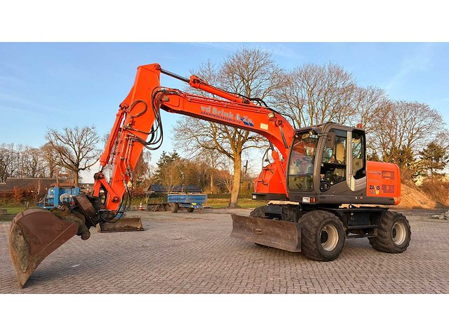 2009 hitachi zx140w-3 banden graafmachine - afbeelding 1 van  19