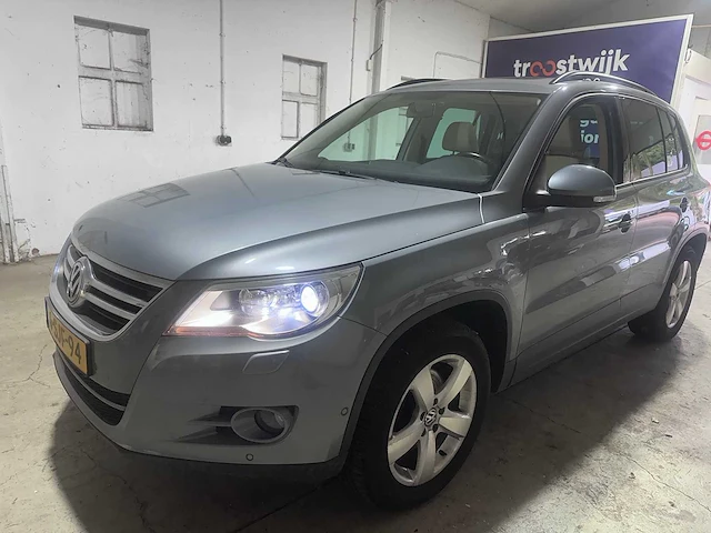 2010 - volkswagen - tiguan - 1.4 tsi sport&style - 6-sjf-94 - afbeelding 1 van  22