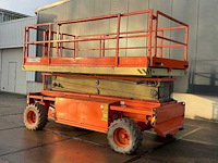 2010 holland lift q 135 el 24 schaarhoogwerker - afbeelding 1 van  23