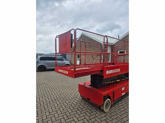 2010 manitou 100 xel elektrische schaarhoogwerker – 10,2 m – 450 kg – nieuwe accu’s - afbeelding 13 van  18